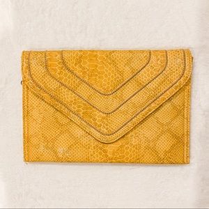 Mustard Snake Print Clutch - Jennifer Lopez